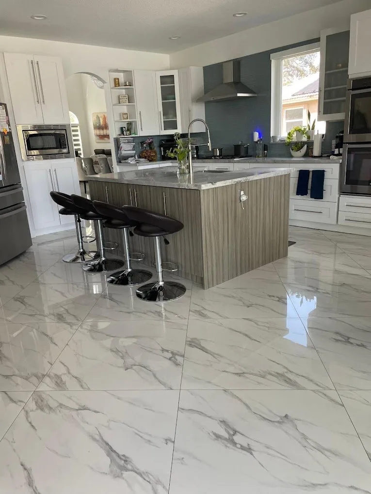 Bright kitchen and polished tile floors from Mita's work gallery